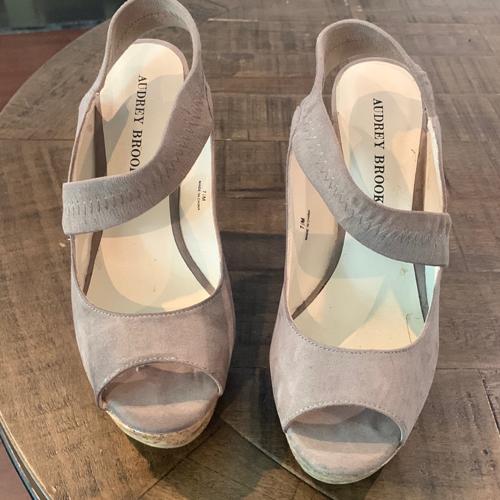 A pair of Audrey Brooke wedge
